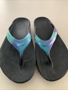 Oofos Black Flip Flops with Iridescent Teal-Purple Straps